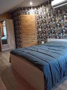 Chalets Chalet Le Nid Douillet avec jacuzzi et sauna privatifs : photos des chambres