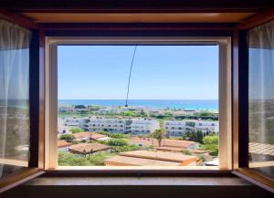 Maestrale Panoramic Penthouse in Porto Cesareo with Ocean Views