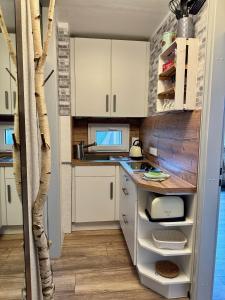 Erstklassige Ferienwohnung - zentral, Gipfelblick, Parkplatz, Schlitten & Bettwäsche inklusive!