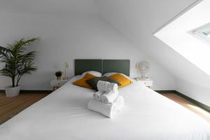 Appartements Residence Bains Callou situee face aux thermes : photos des chambres