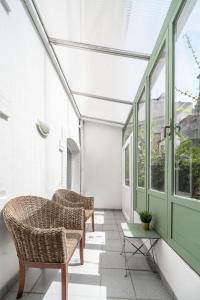 Appartements Residence Bains Callou situee face aux thermes : photos des chambres
