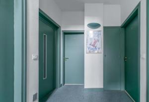 Appartements Residence Bains Callou situee face aux thermes : photos des chambres