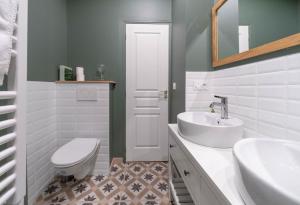 Appartements Residence Bains Callou situee face aux thermes : photos des chambres