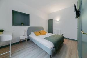 Appartements Residence Bains Callou situee face aux thermes : photos des chambres