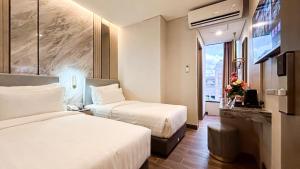 Phòng Deluxe Giường Đôi/2 Giường Đơn (Deluxe Double or Twin Room)