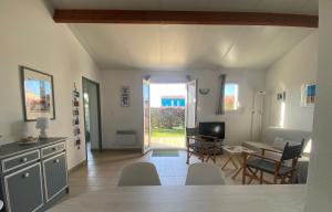 Maisons de vacances Maison cosy avec piscine partagee : photos des chambres