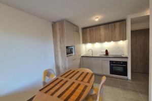 Appartements NEW ! Altitude 1327 Residence at the foot of the slopes : photos des chambres