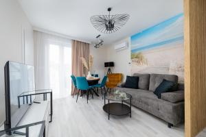 Eleganckie Apartamenty Blisko Plaży w Niechorzu z Klimatyzacją w Salonie i Parkingiem by Noclegi Renters - 3hvězdičkové hotely ve městě Niechorze