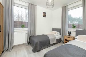 Stylowy Apartament z Ogrodem & Parkingiem by Noclegi Renters