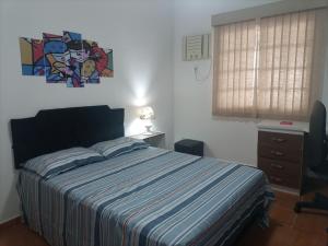 Casa com 2 piscinas e ar condicionado