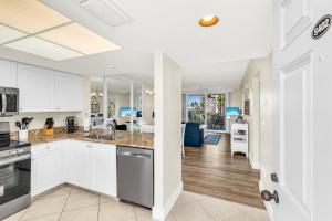 Free Beach Access at this Updated 2 Bed 2 Bath