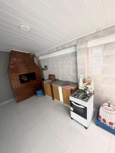 Casa com Piscina e Churrasqueira