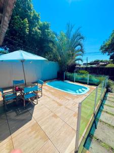 Casa com Piscina e Churrasqueira