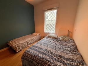 Sejours chez l'habitant Appartement partage avec jardin - metro 11 & 9 : photos des chambres