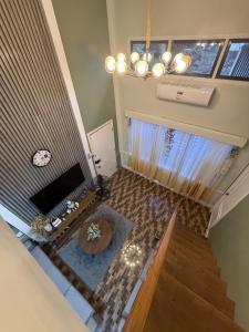 QHouse - 2 Storey House with 4 Bedrooms and 2 Bathrooms