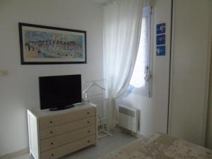 Appartements Le Pamplemousse : photos des chambres