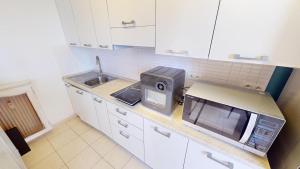 Appartements Charmant studio en bord de mer : photos des chambres