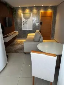 Flat central com elevador e garagem - Bocaiúva