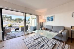 Appartements Appartement les pieds dans l-eau - T2 de standing : photos des chambres