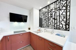 Appartements Appartement les pieds dans l-eau - T2 de standing : photos des chambres