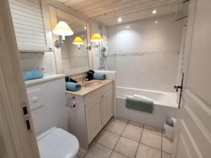 Appartements Studio les Pieds dans L'eau au bord du lac d'Annecy : photos des chambres