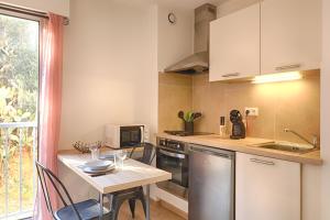 Appartements Beau studio Routes des Sanguinaires proche de la plage : photos des chambres