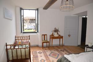 Maisons de vacances Des Racines et des Reves : photos des chambres
