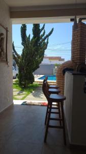 Sobrado Itanhaém, 3 suítes com ar condicionado