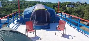 Rooster Run Glamping Camping has rooftop and off the ground Glamping experience for 1 to 16 in a single tent and views of The Rain Forrest and to Culebra across the Atlantic Ocean w Tents, Linens, Deluxe Air Beds, Warm Shower and More at a Great Price - Proyecto Barracon