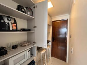 Hosts BR - Flat frente mar c cozinha