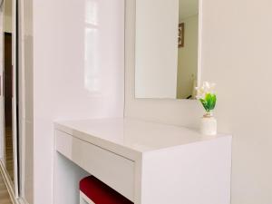 Good and Simply 1BR at Sudirman Suites Apartment By Travelio