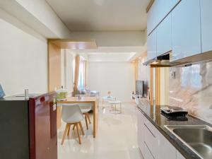 Comfort 2BR Apartment at Meikarta Cikarang By Travelio