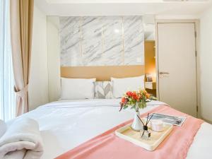 Comfort 2BR Apartment at Meikarta Cikarang By Travelio