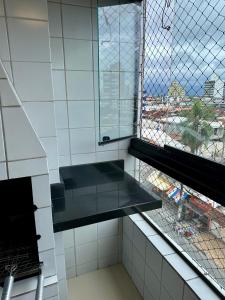 APÊ com Varanda Gourmet à poucos passos do MAR