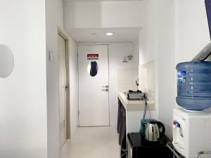 Cozy Living Studio Grand Sentraland Karawang Apartment By Travelio