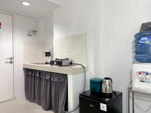 Cozy Living Studio Grand Sentraland Karawang Apartment By Travelio