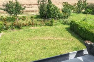 Maisons de vacances Maison avec jardin a Itteville et vue sur le jardin : photos des chambres