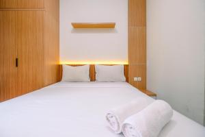 Simply and Nice Studio at Transpark Cibubur Apartment By Travelio