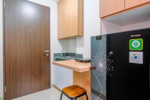 Simply and Nice Studio at Transpark Cibubur Apartment By Travelio
