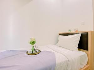 Modern and Serene Look 2BR Tokyo Riverside PIK 2 Apartment By Travelio