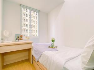 Modern and Serene Look 2BR Tokyo Riverside PIK 2 Apartment By Travelio