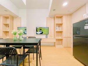 Modern and Serene Look 2BR Tokyo Riverside PIK 2 Apartment By Travelio