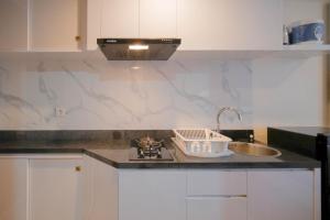 Compact and Comfortable Living Studio at Grand Sungkono Lagoon Apartment By Travelio