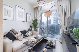 Awesome 1-Bedroom Apartment for 4 with Burj Views at Vera Tower in Business Bay
