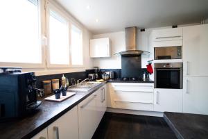 Appartements bright modern, near center and 10 min from beaches : photos des chambres