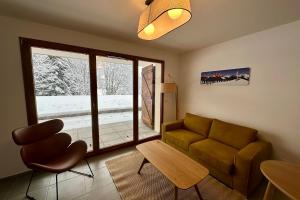 Appartements NEW ! Altitude 1327 Residence at the foot of the slopes : photos des chambres