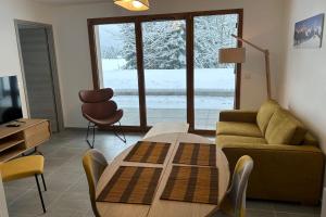 Appartements NEW ! Altitude 1327 Residence at the foot of the slopes : photos des chambres