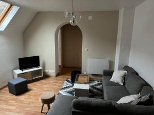 Appartements Beau duplex proche centre : photos des chambres