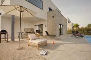 Villa Cala Sonriso for 8 people near Pula with heated pool & sea view