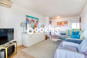 Rancho suizo Apartament per 4 persones amb vistes al mar amb piscina comunitària